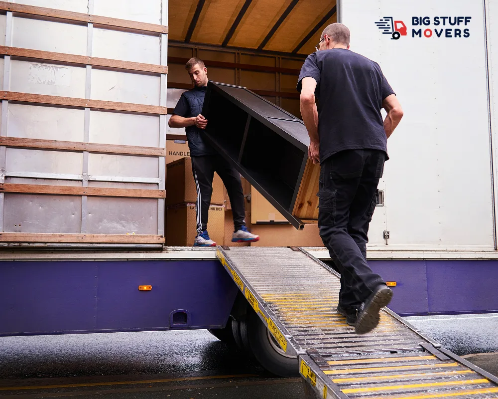 Big Stuff Movers team packing furniture for a Melbourne move