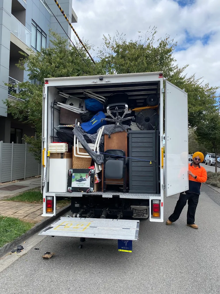 Big Stuff Movers fully loaded moving truck packed with furniture, appliances, and boxes, ready for secure transport during a relocation.